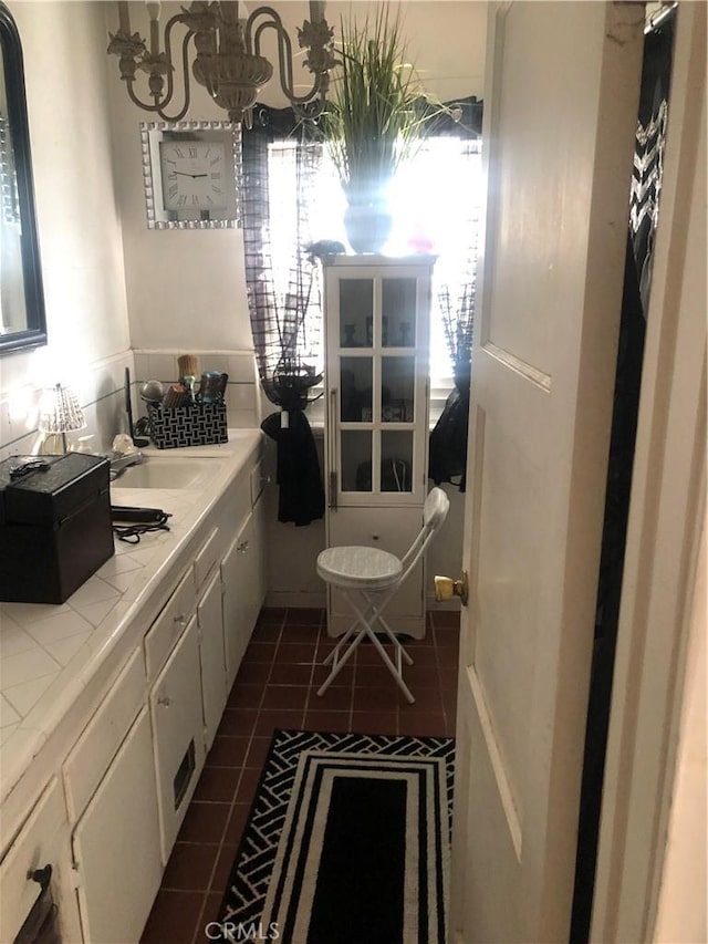 bathroom with tile patterned flooring and vanity