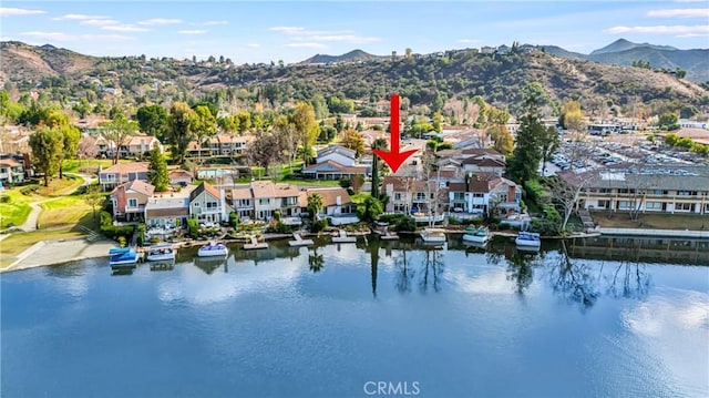 bird's eye view featuring a water and mountain view