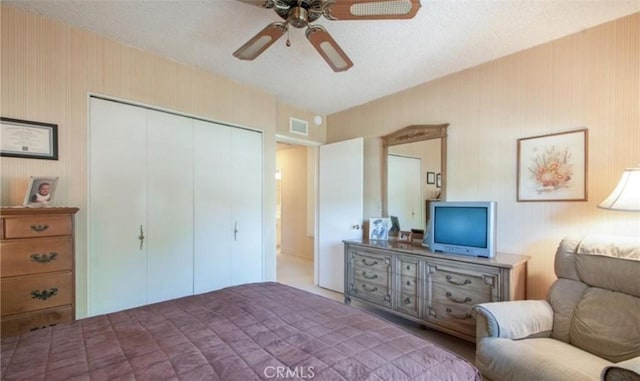 bedroom with a closet and ceiling fan