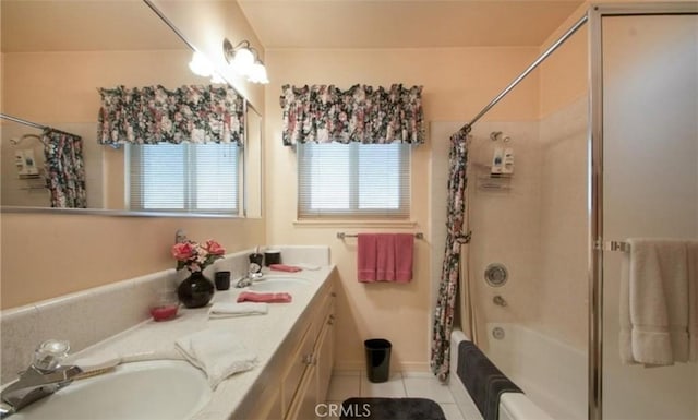 bathroom with tile patterned flooring, vanity, and shower / bath combination with curtain