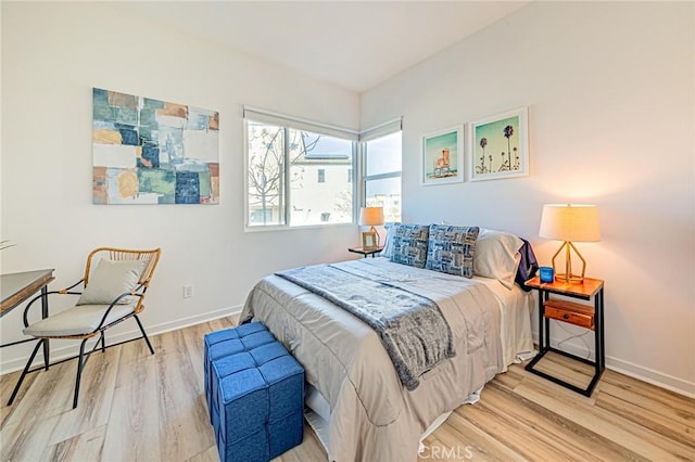 bedroom featuring light hardwood / wood-style floors