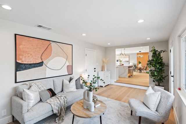 living room with hardwood / wood-style flooring