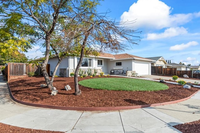 ranch-style home with a garage