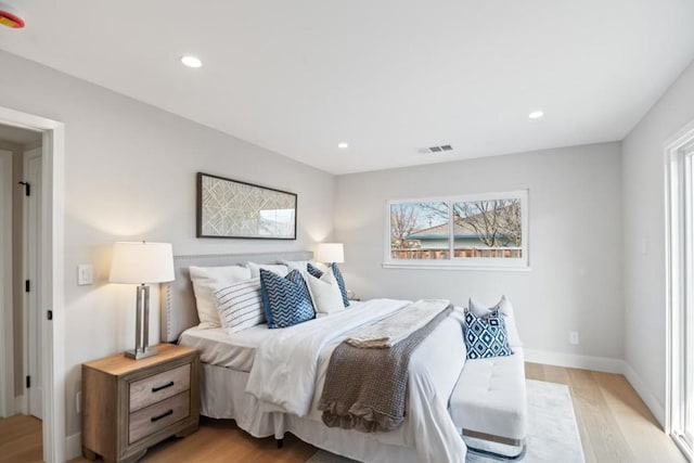 bedroom with light wood-type flooring