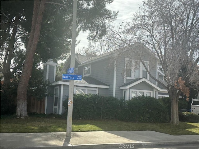 view of front of home with a front yard