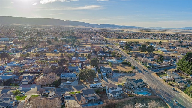 birds eye view of property featuring a residential view and a mountain view