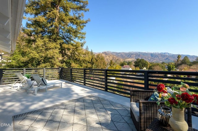 view of patio with a mountain view