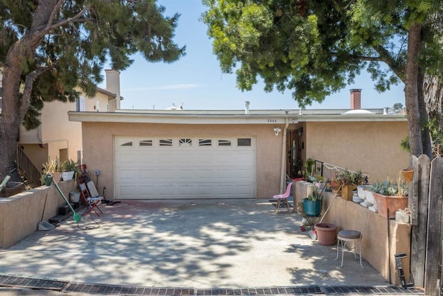 single story home with a garage