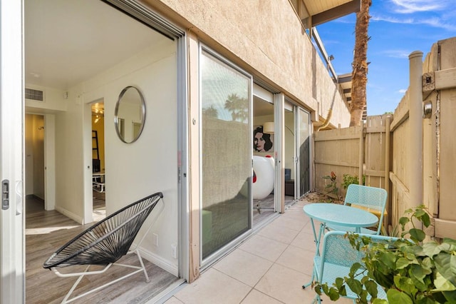 balcony with a patio area