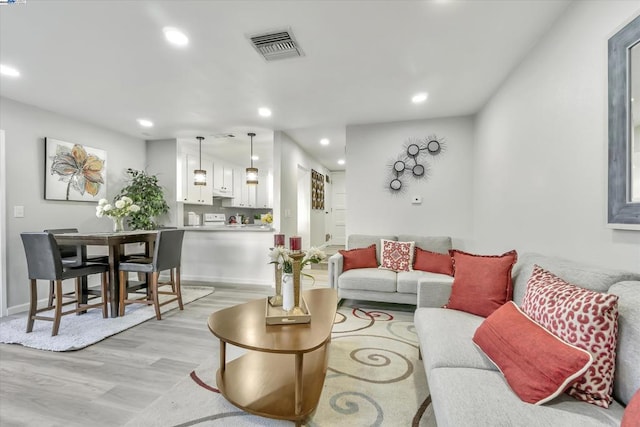 living room featuring light hardwood / wood-style flooring