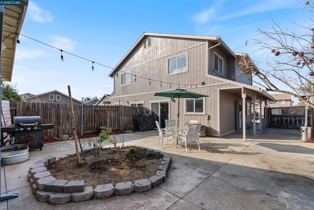 back of house featuring a patio