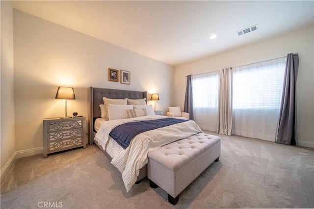 bedroom with light carpet