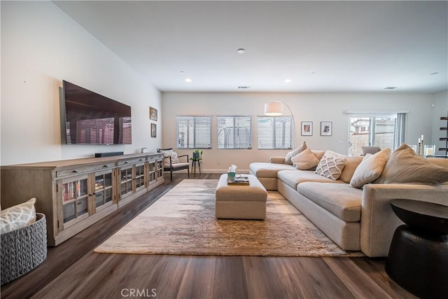 living room featuring dark hardwood / wood-style floors