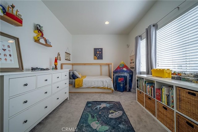 bedroom with light carpet