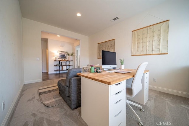 home office featuring light carpet