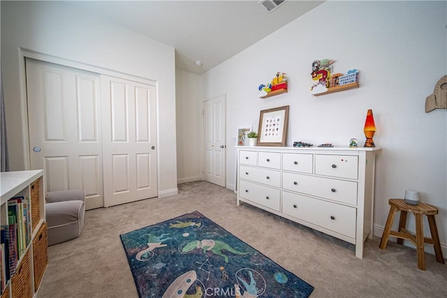 bedroom with light carpet