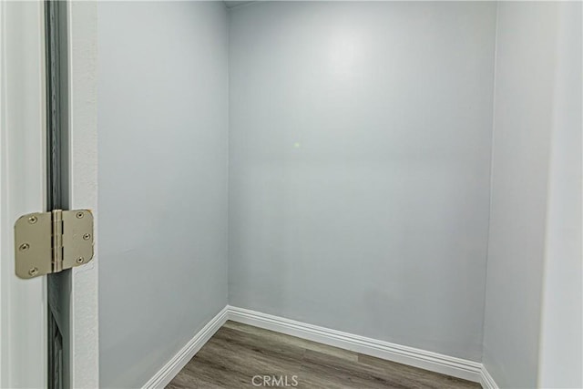 empty room featuring dark wood-type flooring