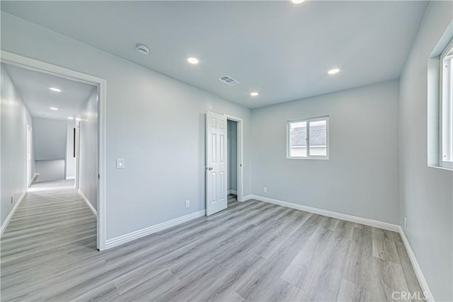 unfurnished bedroom featuring light hardwood / wood-style floors