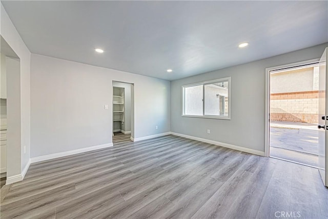 empty room with light wood-type flooring