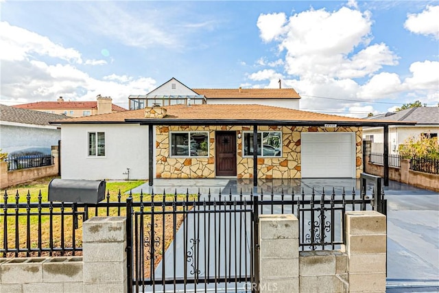 view of front of property featuring a garage