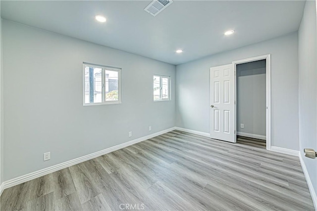 unfurnished bedroom featuring light hardwood / wood-style flooring