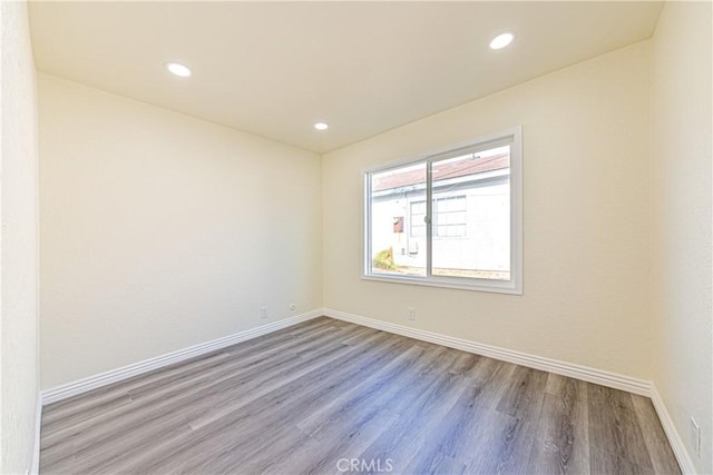 unfurnished room featuring light wood-type flooring