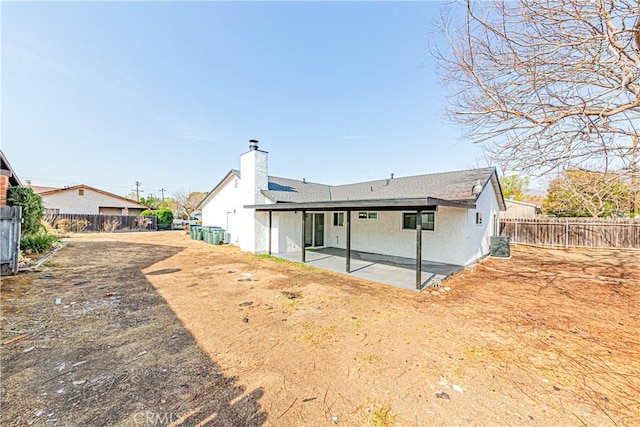 back of property featuring a patio and central air condition unit