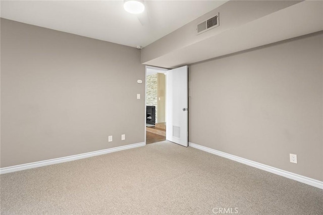 unfurnished room featuring carpet floors