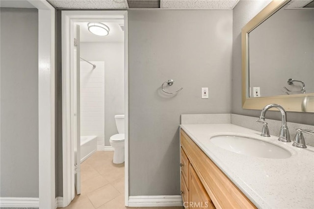 full bathroom with vanity, toilet, tile patterned floors, and shower / tub combination