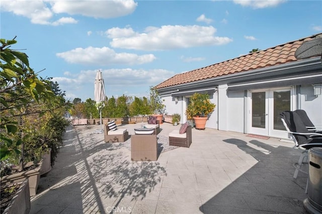 view of patio featuring an outdoor hangout area and french doors