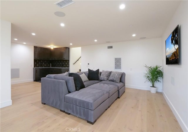 living room featuring light hardwood / wood-style floors