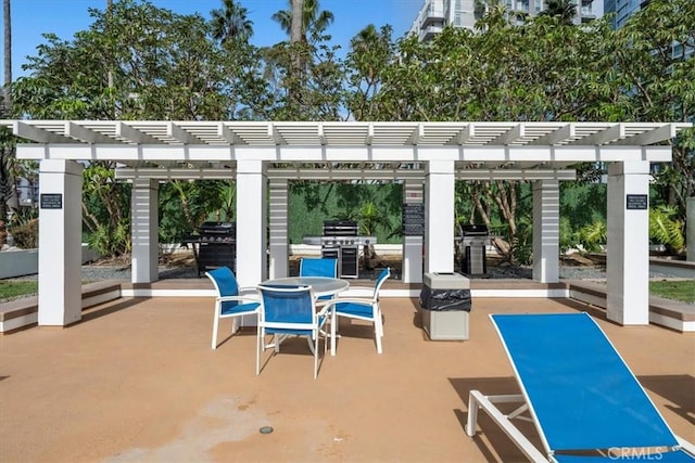 view of patio / terrace featuring a pergola and grilling area