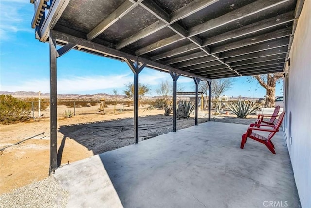 view of patio with a mountain view