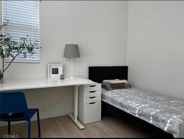 bedroom featuring light hardwood / wood-style floors