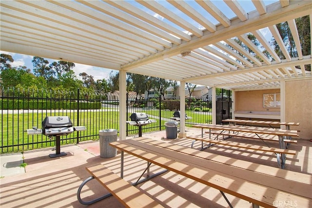 view of patio / terrace featuring area for grilling and a pergola