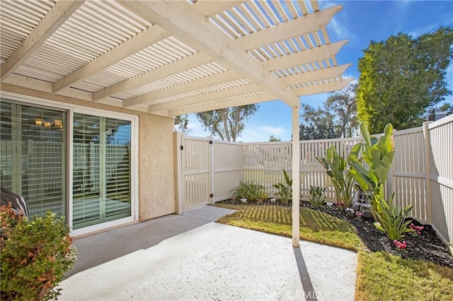 view of patio featuring a pergola