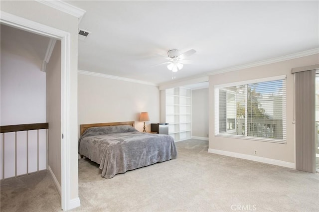 carpeted bedroom featuring crown molding and ceiling fan