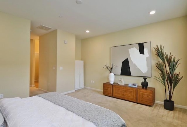 bedroom featuring light colored carpet