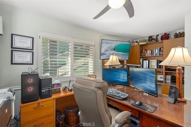 office space with ceiling fan