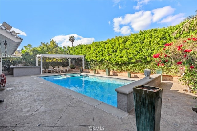 view of swimming pool featuring a gazebo and a patio area