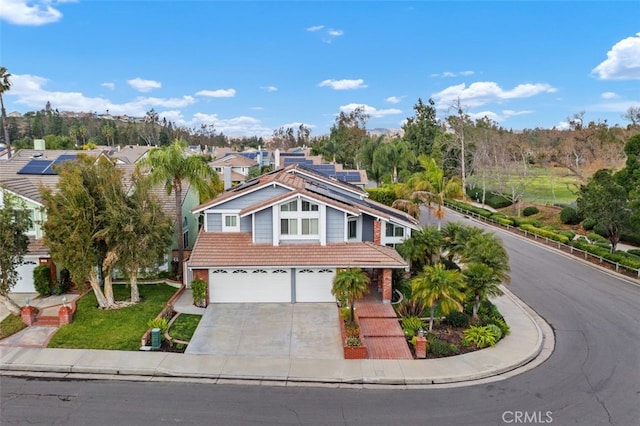 front of property with a garage