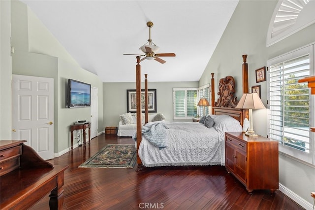 bedroom featuring dark wood-type flooring, ceiling fan, and high vaulted ceiling