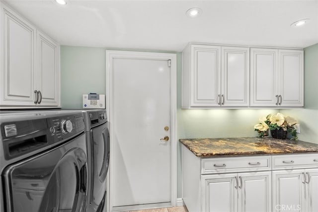 clothes washing area featuring cabinet space, recessed lighting, and washing machine and dryer