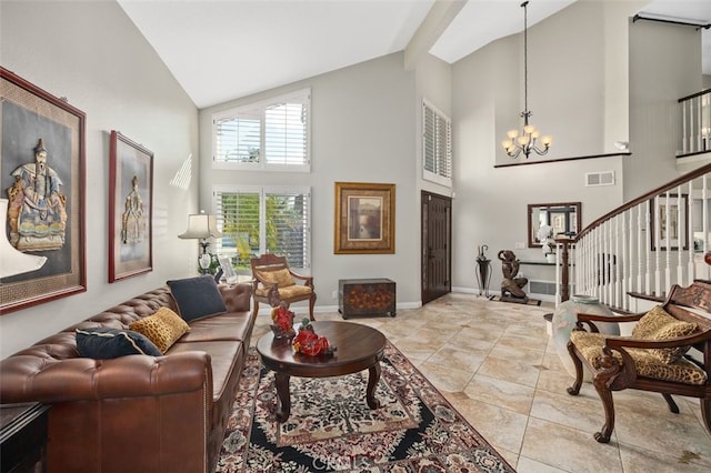 living room featuring light tile patterned flooring, a notable chandelier, and high vaulted ceiling