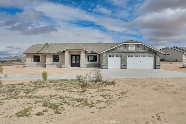 view of front of home featuring a garage