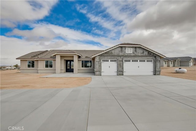 view of front of home featuring a garage