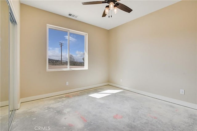 spare room with ceiling fan