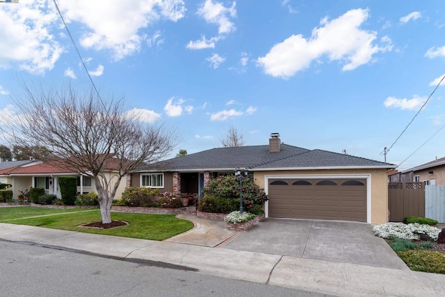 single story home with a garage and a front lawn