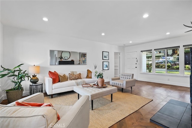 living room featuring parquet flooring