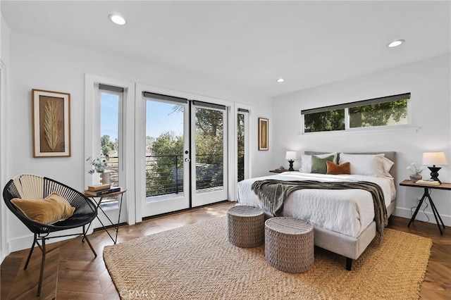 bedroom with access to exterior and parquet floors